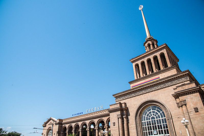 The grand facade of the Yerevan Railway Station (Sasuntsi Davit) under a clear blue sky